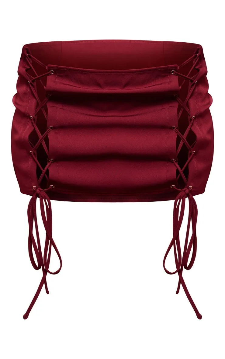 Mini-jupe tissée rouge cerise à lacets