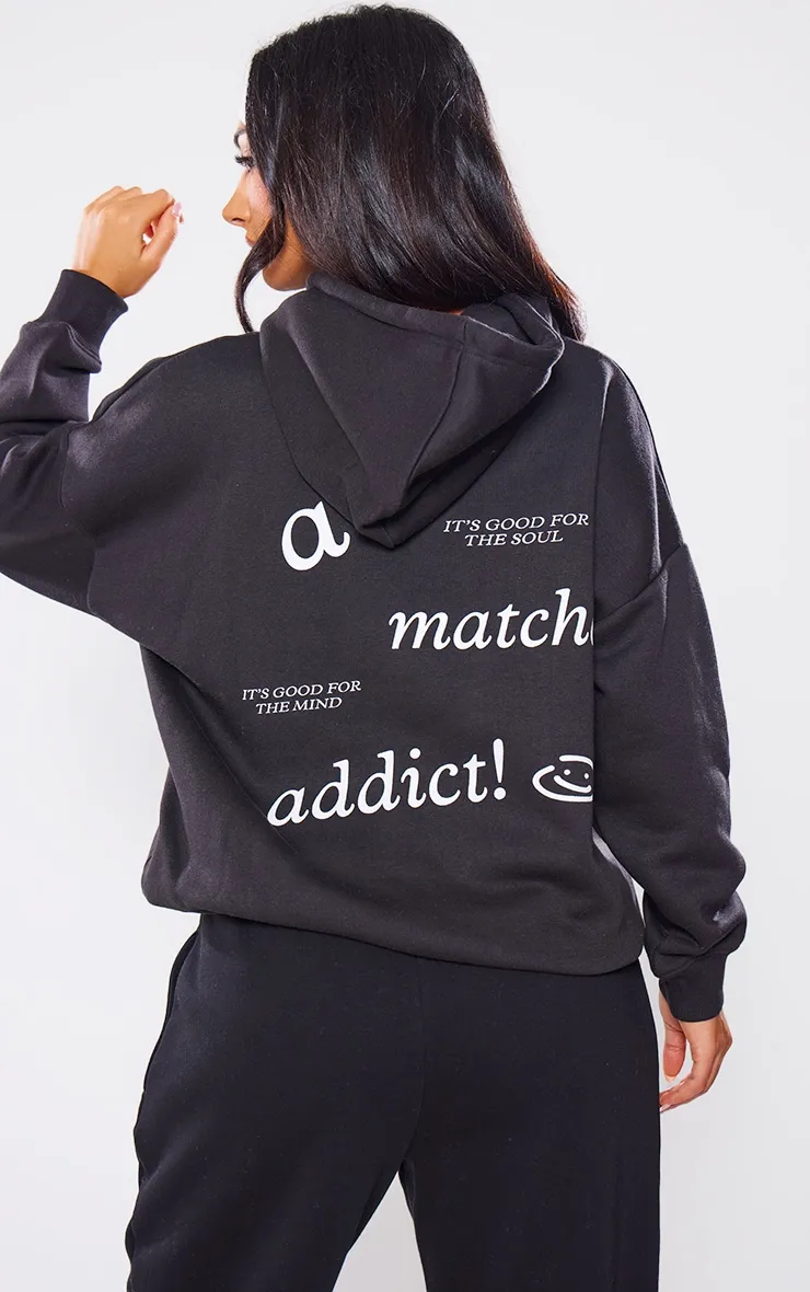 Petite Hoodie noir à détail slogan