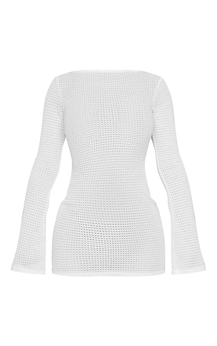 Petite Mini robe texturée blanche à dos ouvert